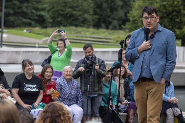 Irish comedy writer Graham Linehan performs outside the Scottish Parliament after Leith Arches cancelled a Comedy Unleashed event at which he was due to appear when complaints were made to the venue. Picture: Katielee Arrowsmith/SWNS