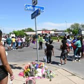 Mourners gather near a Tops Grocery store in Buffalo, New York, following the weekend shooting.