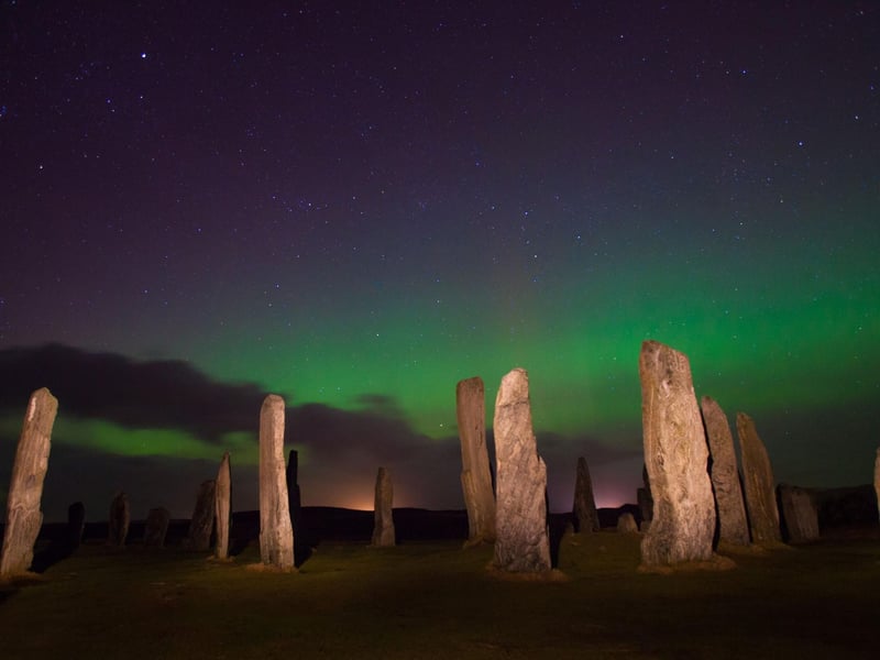 Another island destination offering the perfect combination of dark skies and a northern latitude is the Outer Hebrides. For a truly magical experience, try to see them over the atmospheric Callanish Standing Stones on Lewis.
