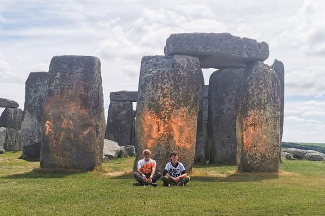 In the latest of several similar stunts, Just Stop Oil protesters sprayed an orange substance on Stonehenge (Picture: Just Stop Oil/PA Wire)