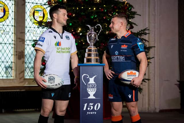 George Horne and Ben Vellacott have a light-hearted stare-off at Stirling Castle as they promote the 1872 Cup. (Photo by Ross Parker / SNS Group)