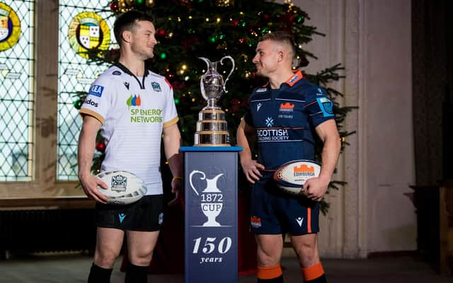 George Horne and Ben Vellacott have a light-hearted stare-off at Stirling Castle as they promote the 1872 Cup. (Photo by Ross Parker / SNS Group)