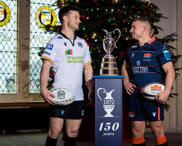 George Horne and Ben Vellacott have a light-hearted stare-off at Stirling Castle as they promote the 1872 Cup. (Photo by Ross Parker / SNS Group)