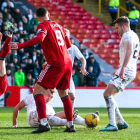 Hibs defender Ryan Porteous was sent off for a tackle on Ross McCrorie in the box.