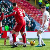 Hibs defender Ryan Porteous was sent off for a tackle on Ross McCrorie in the box.