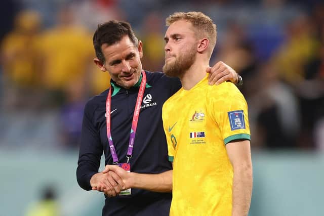Australia and Hearts defender Nathaniel Atkinson, right, has an ankle injury.
