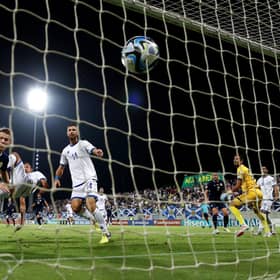 Scott McTominay heads home Scotland's opening goal in Larnaca against Cyprus.