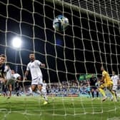 Scott McTominay heads home Scotland's opening goal in Larnaca against Cyprus.