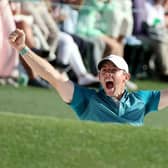 Rory McIlroy celebrates after holing out from a bunker on the 72nd hole in last year's Masters to finish second behind Scottie Scheffler. Picture: Gregory Shamus/Getty Images.