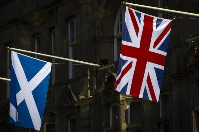 Scottish flag hanging next to Union Jack