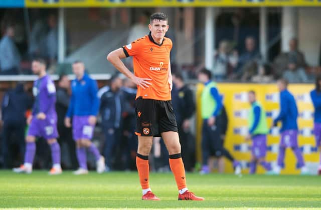 Dundee Utd's Ross Graham is dejected during a cinch Premiership match between Dundee United and St Johnstone at Tannadice, on October 01, 2022, in Dundee, Scotland. (Photo by Mark Scates / SNS Group)