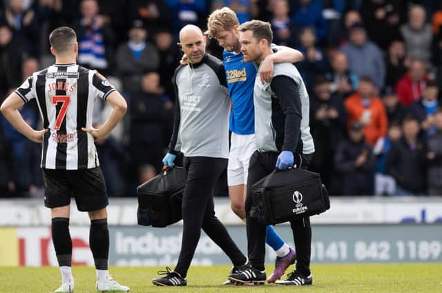Rangers centre-half Filip Helander is helped off during a 4-0 win over St Mirren in April. He has not been seen in a Rangers shirt since. (Photo by Craig Williamson / SNS Group)