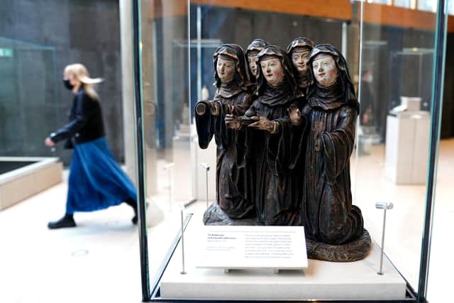 Members of staff and workers at The Burrell Collection in Glasgow are putting the finishing touches to a refurbishment of the museum ahead of its reopening next month. (Picture: Jane Barlow/PA Wire)