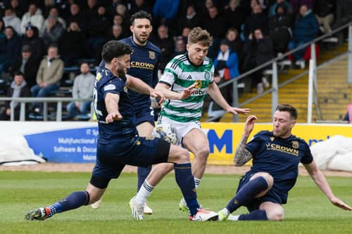 James Forrest evades Dundee's Jordan McGhee and Ricki Lamie to score his and Celtic's second. (Photo by Craig Foy / SNS Group)