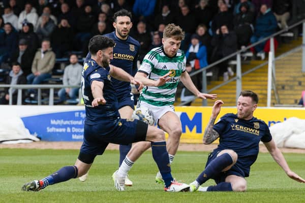 James Forrest evades Dundee's Jordan McGhee and Ricki Lamie to score his and Celtic's second. (Photo by Craig Foy / SNS Group)