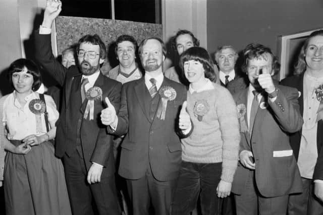 Labour MP Robin Cook, his wife Margaret Cook and supporters celebrate winning the Livinsgton seat in the General Election, June 1983.