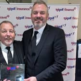 TGI Golf managing director Eddie Reid was presented with the Ian Johnston Lifetime Achievement Award by Michael Brooks, the PGA professional at Pumpherston and TGI Golf board member. Picture: TGI Golf.