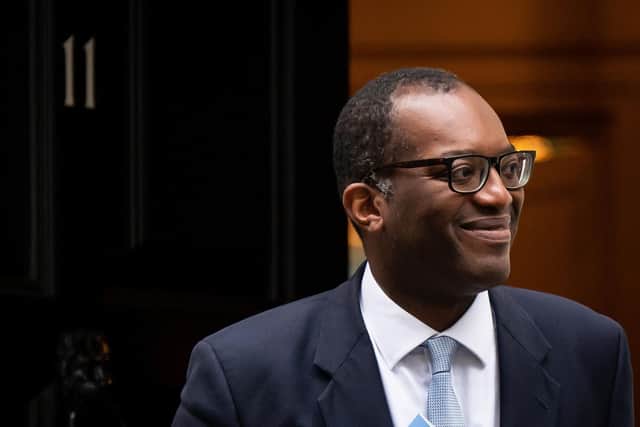 Chancellor of the Exchequer Kwasi Kwarteng leaves 11 Downing Street to make his way to the Treasury Department to deliver his mini-budget.