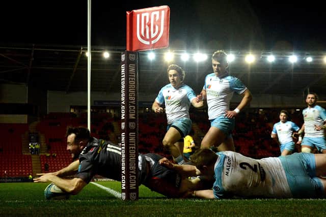 Ryan Conbeer of Scarlets scores a try.
(Photo: Ben Evans/Huw Evans/Shutterstock -12835296bc)