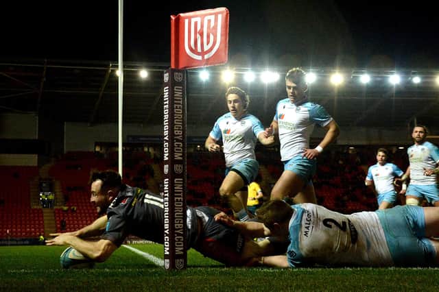 Ryan Conbeer of Scarlets scores a try.
(Photo: Ben Evans/Huw Evans/Shutterstock -12835296bc)