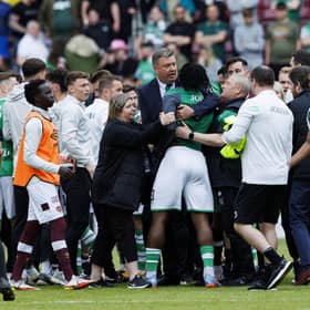 Hibs' Rocky Bushiri clashes with Hearts players at full time of last weekend's derby.