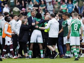 Hibs' Rocky Bushiri clashes with Hearts players at full time of last weekend's derby.