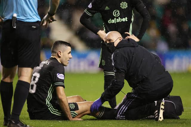 Celtic's Tom Rogic goes off with an injury during the 3-1 win over Hibs at Easter Road. (Photo by Craig Williamson / SNS Group)