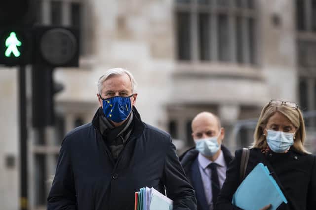 EU's chief negotiator Michel Barnier and his team walks back to his hotel in Westminster after leaving meetings on Victoria Street, London. Picture: Victoria Jones/PA Wire