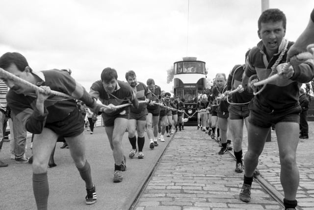 Shawlands rugby club take part in a sponsored tram pull for Telethon 88 at Glasgow Garden Festival in May 1988.