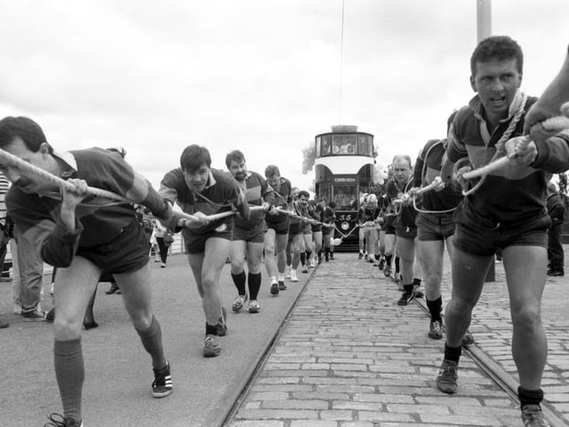 Shawlands rugby club take part in a sponsored tram pull for Telethon 88 at Glasgow Garden Festival in May 1988.