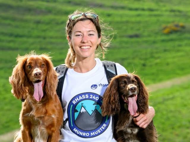 Munro-bagging Hollie Jenkins and her two spaniels Hugo and Spencer support the launch of Munro Muster. Picture: RHASS