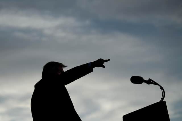 The task of rebuilding a nation torn apart by Donald Trump will outlast Joe Biden's presidency (Picture: Brendan Smialowski/AFP/Getty)