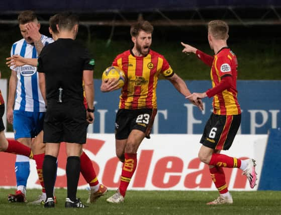 Partick Thistle's Ross Docherty (centre) celebrates his late equaliser in the 1-1 draw with Kilmarnock. (Photo by Craig Foy / SNS Group)