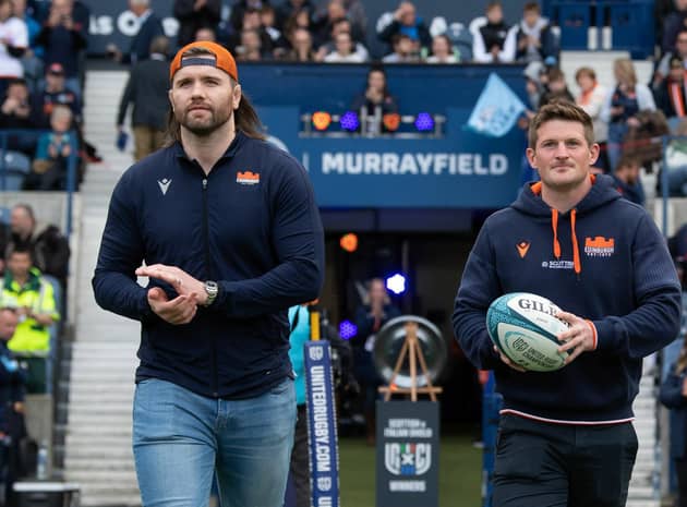 James Johnstone, right, with Ben Toolis, delivers the match ball ahead of Edinburgh's match with Glasgow Warriors.  (Photo by Ross Parker / SNS Group)