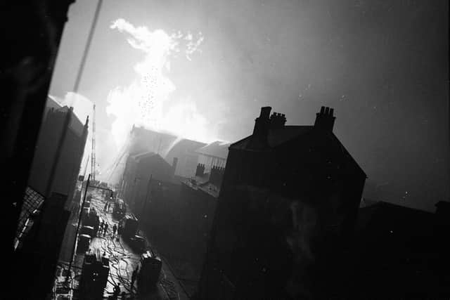 Arbuckle Smiths Whiskey Bond in Cheapside Street near Anderston Quay in March 1960. Flames shoot high as the fire spreads.