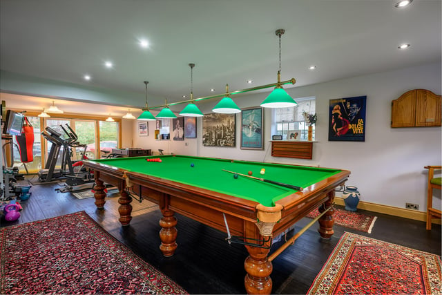 Not all parts of the house are classically 1920s. The couple are keen snooker players, so two rooms at the side of the house – an office and playroom – and the garage were joined together to create a modern games room, with a full-sized baize.