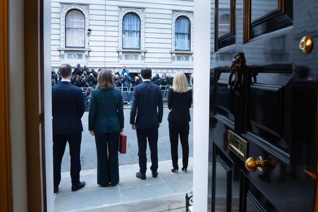 Chancellor Rachel Reeves (second left) with members of her Treasury team on the steps of 11 Downing Street before delivering the Budget yesterday (Picture: Stefan Rousseau/PA Wire)