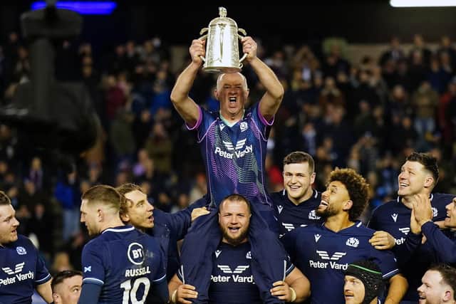 Scotland's retiring chief medical officer Dr James Robson lifts the Calcutta Cup after the win over England at Murrayfield last month.  (Picture: Jane Barlow/PA)