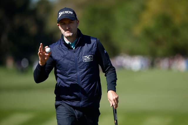 Russell Knox acknowledges the crowd at TPC Sawgrass. Picture: Jared C. Tilton/Getty Images.