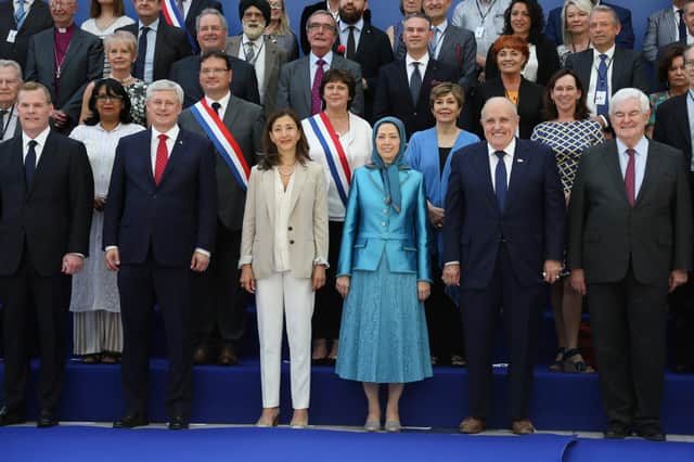 Delegates at the "Free Iran" event in Villepinte near Paris in 2018 included (front row, from left to right): Canadian foreign minister John Baird, retired Canadian politician Stephen Joseph, Colombian-French politician Ingrid Betancourt, Maryam Rajavi, leader of the People's Mujahedin of Iran, and attorney to Donald Trump Rudolph Giuliani, and former US House Speaker Newt Gingrich (Picture: Zakaria Abdelkafi/AFP via Getty Images)