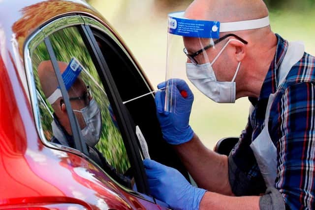 Only those with Covid-19 symptoms should arrange to have a test carried out (Photo: ADRIAN DENNIS/AFP via Getty Images)