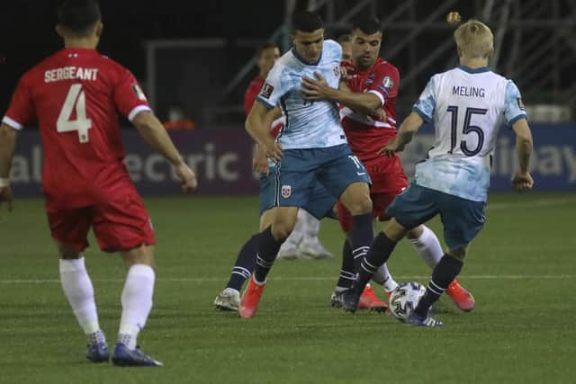 Norway's Mohamed Elyounoussi fights for the ball during the World Cup 2022 group G qualifying soccer match between Gibraltar and Norway in Gibraltar, Wednesday March 24, 2021. (AP Photo/Javier Fergo)