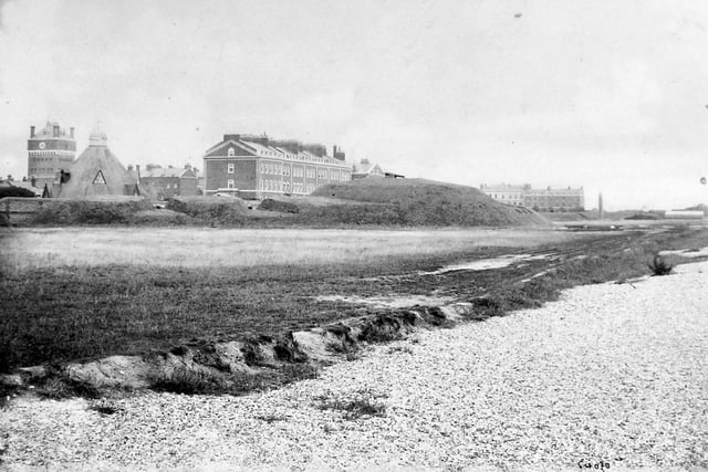 View of Eastney Barracks from the south-west c1890. Eastney Fort West can be seen in the foreground with a gun showing. Eastney Fort East is just visible in the far distance to the right. Note the esplanade road has yet to be built.
