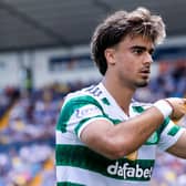 Celtic's Jota points to wrist band bearing Benfica mentor Fernando Chalana's name after putting his side 2-0 up with stunning strike (Photo by Craig Williamson / SNS Group)