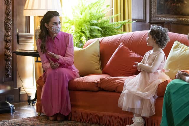 The Duchess of Cambridge meeting Mila Sneddon, aged five, at the Palace of Holyroodhouse in Edinburgh. (Credit: Jane Barlow/PA Wire)