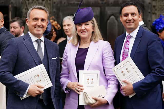 (left to right) Scottish Liberal Democrat leader Alex Cole-Hamilton, Alison Johnstone, Presiding Officer of the Scottish Parliament and Scottish Labour leader Anas Sarwar leaves Westminster Abbey following the coronation ceremony of King Charles III and Queen Camilla in central London. Picture date: Saturday May 6, 2023. PA Photo. See PA story ROYAL Coronation. Photo credit should read: Jane Barlow/PA Wire