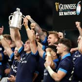 Jamie Ritchie of Scotland lifts the Calcutta Cup after the team's victory against England.