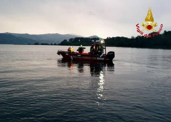 The emergency services are trying to recover the bat which capsized on Lake Maggiore at the weekend. Picture: Getty Images