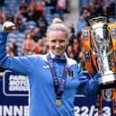 Glasgow City manager Leanne Ross celebrates with the SWPL trophy after the 1-0 win over Rangers at Ibrox. (Photo by Paul Devlin / SNS Group)