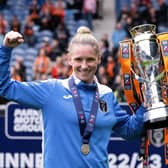 Glasgow City manager Leanne Ross celebrates with the SWPL trophy after the 1-0 win over Rangers at Ibrox. (Photo by Paul Devlin / SNS Group)